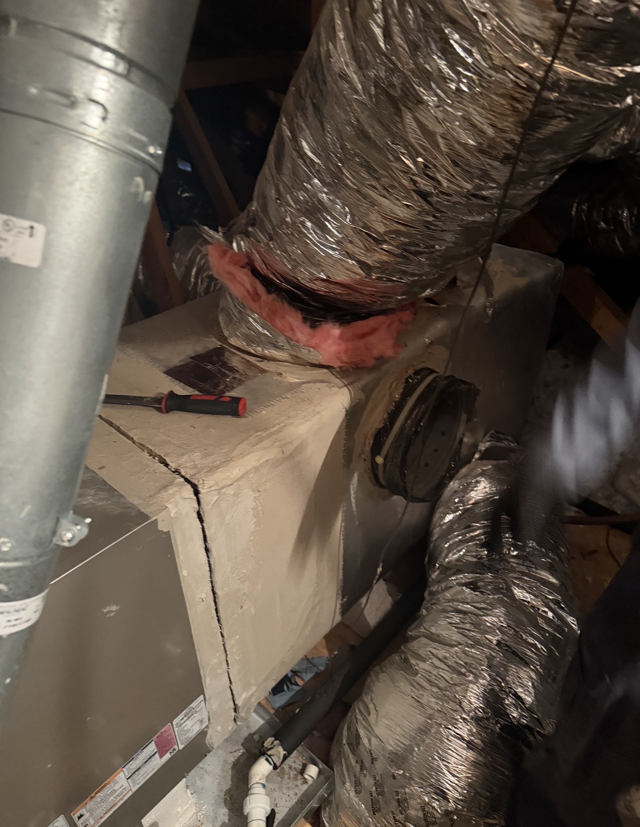 Before — old supply plenum with poorly insulated connections